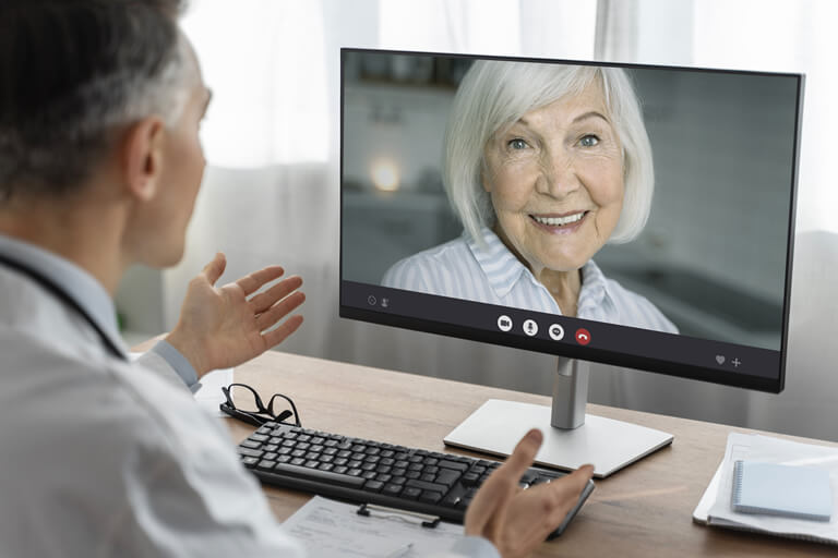 Woman on computer having a a Remote Consultation 